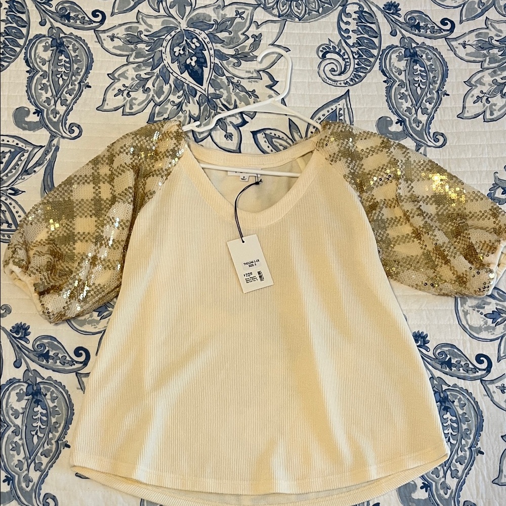 Cream Top with Sequin Plaid Sleeves